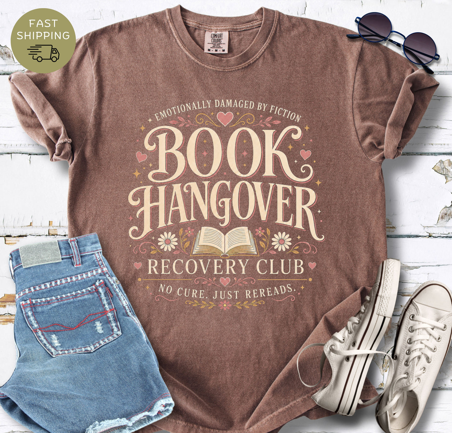 Relaxed-fit black graphic tee with “Book Hangover” typography and a rereads-themed design.