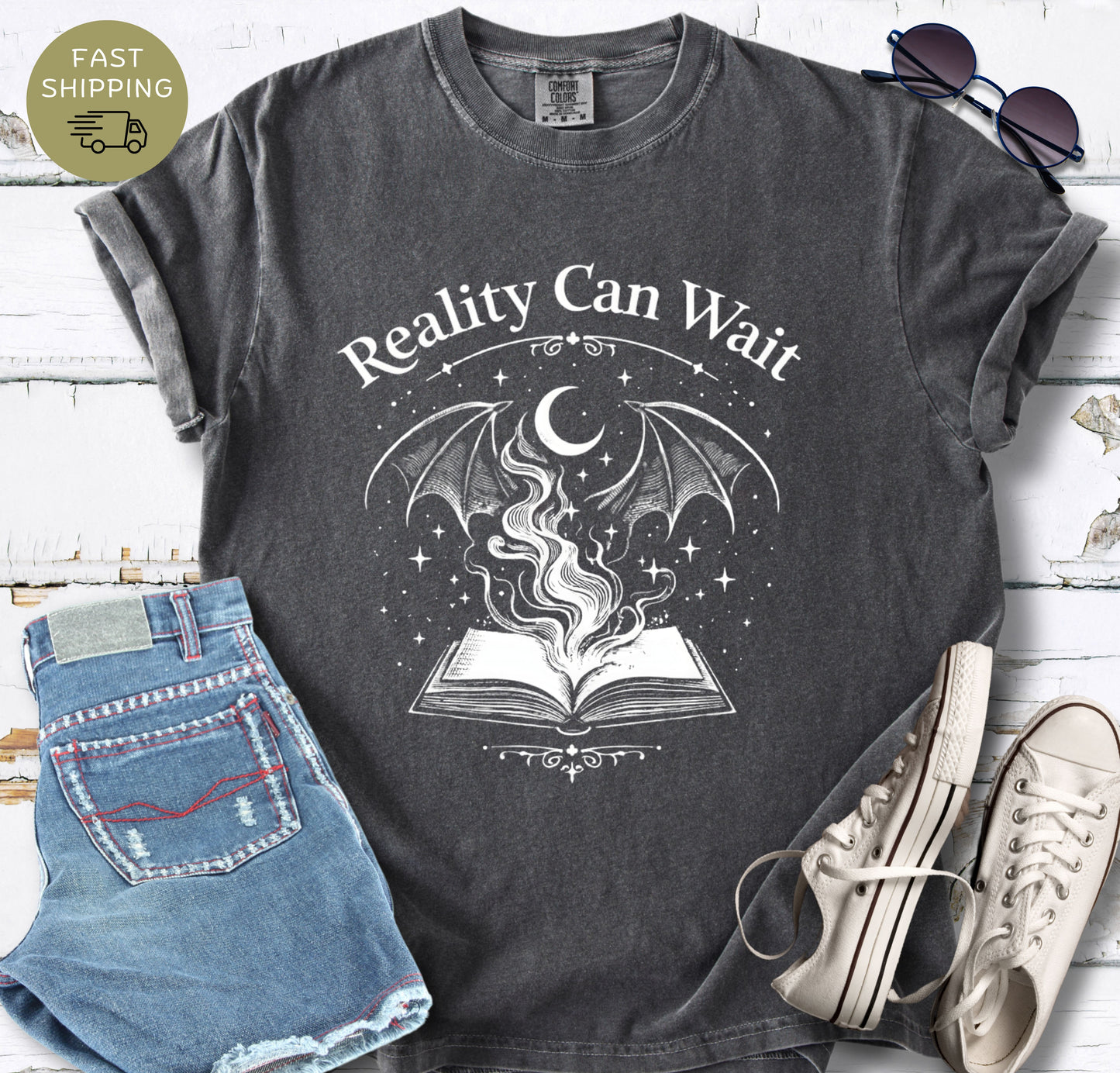 Reality Can Wait fantasy bookish t-shirt with open book and magical design on Comfort Colors 1717 pepper