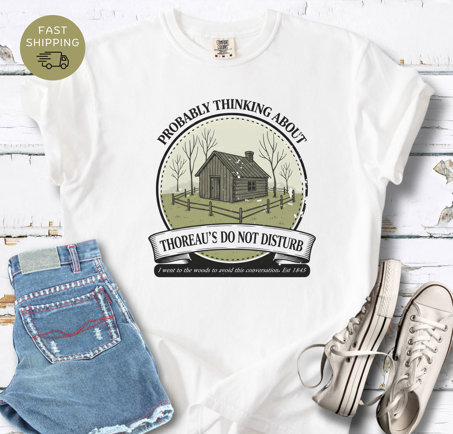 Vintage style book lover tee with Thoreau inspired cabin badge design
