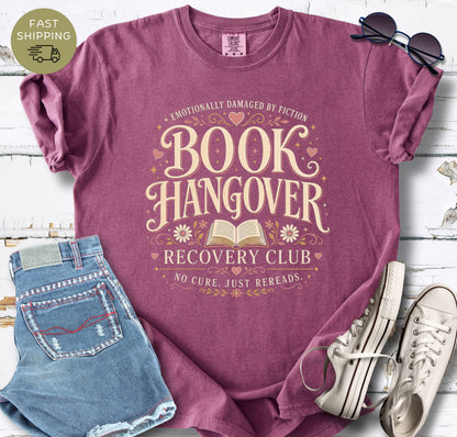 Book lover graphic tee with the words “Emotionally Damaged by Fiction” and “No Cure. Just Rereads.”