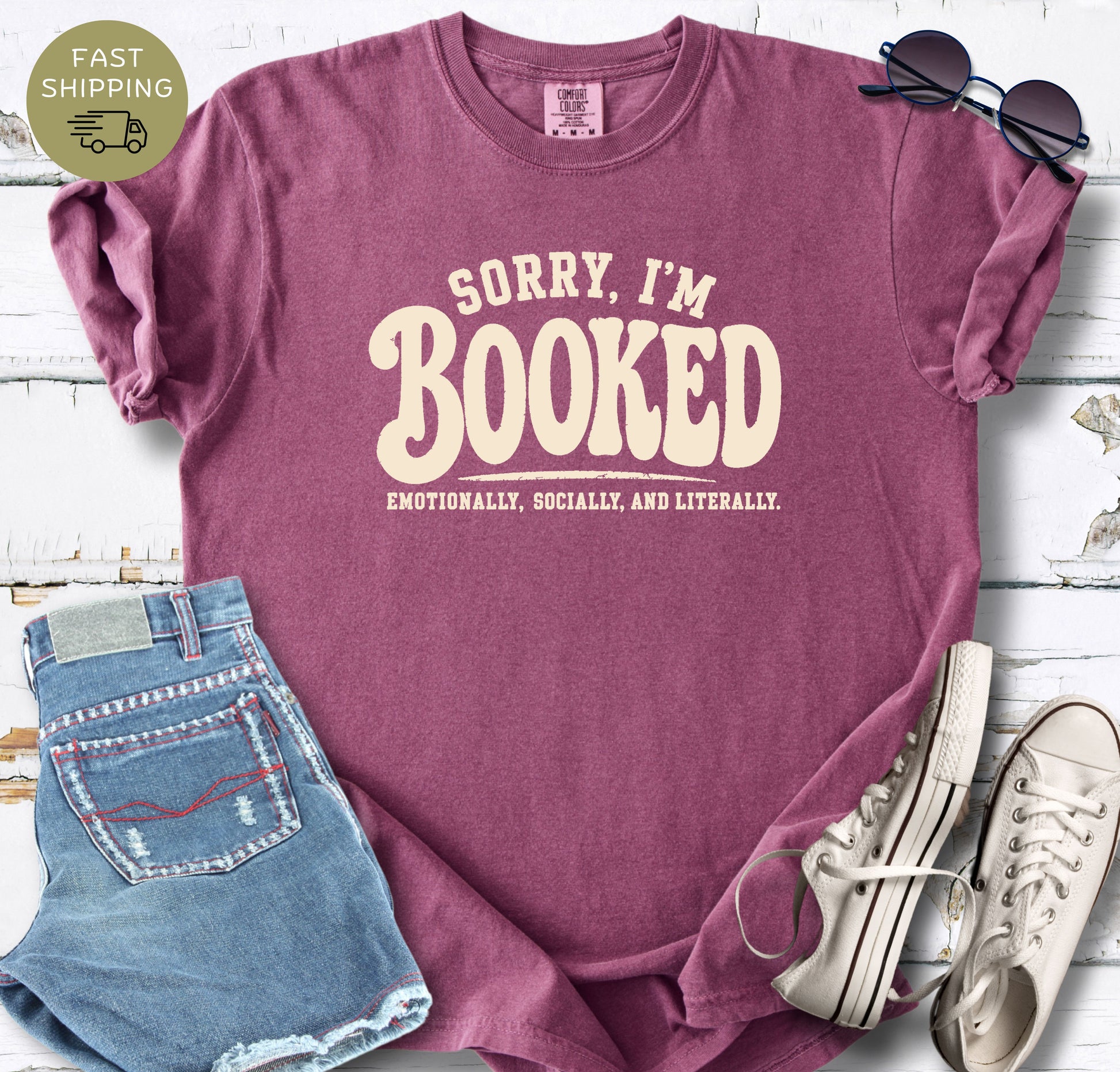 Berry Comfort Colors reader shirt with bold cream retro-style typography.