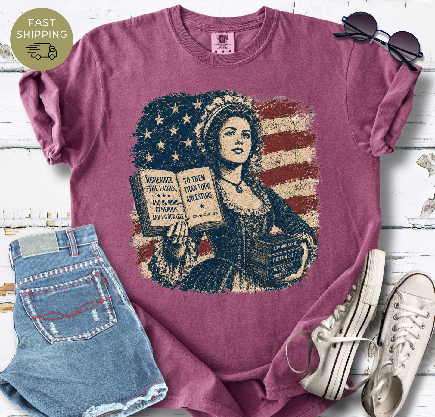 Patriotic book lover t-shirt with distressed American flag and historical literary artwork.