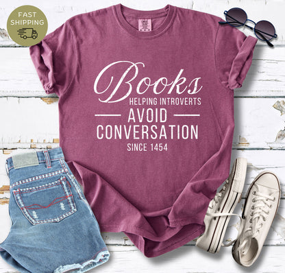 Funny book lover shirt in berry color with introvert reading slogan