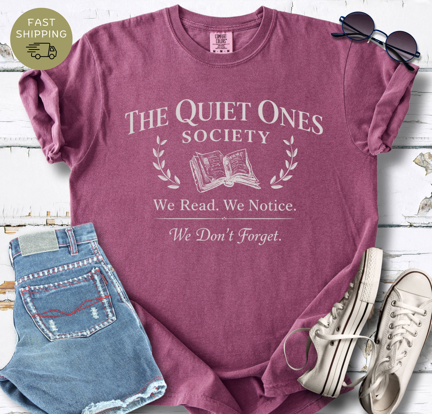 The Quiet Ones Society bookish t-shirt with open book and laurel design