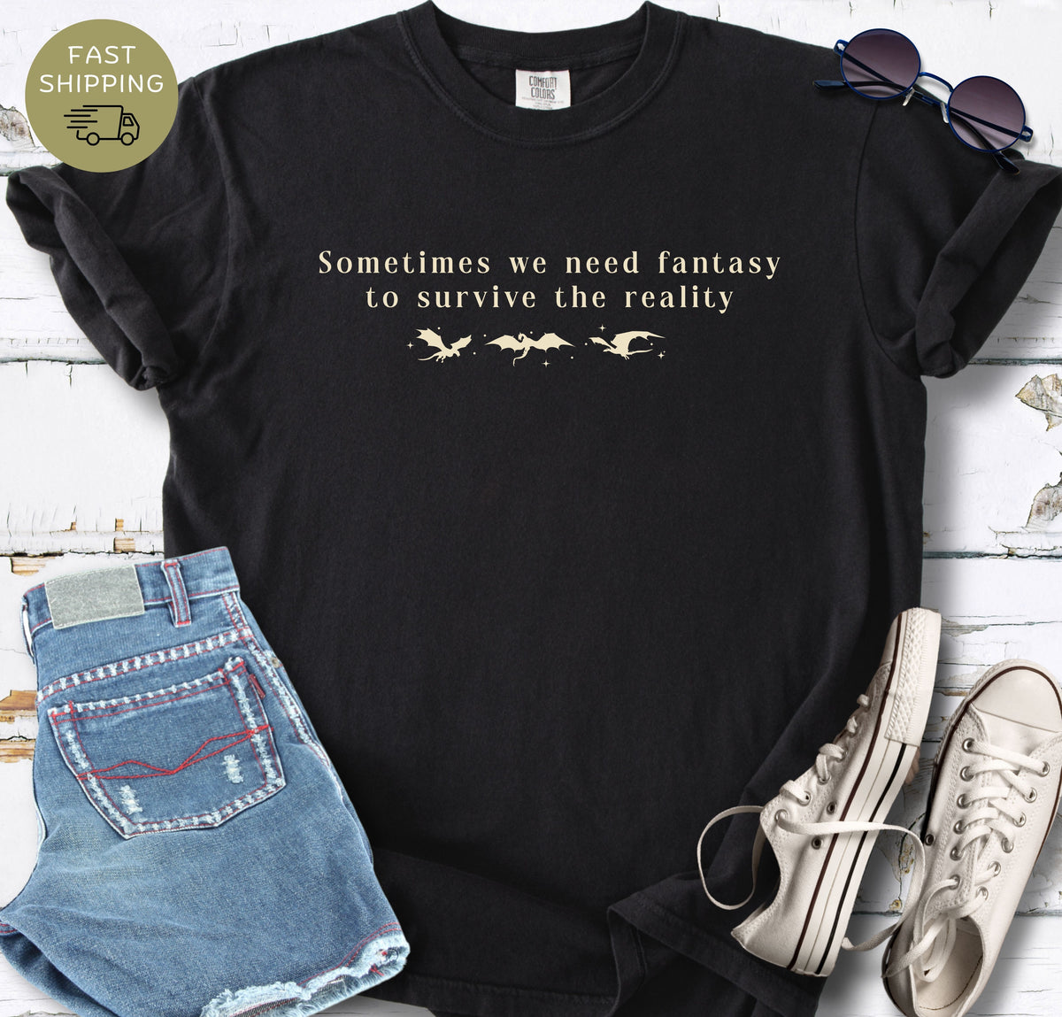 Fantasy reader shirt featuring cream text and three tiny dragons on a black tee.