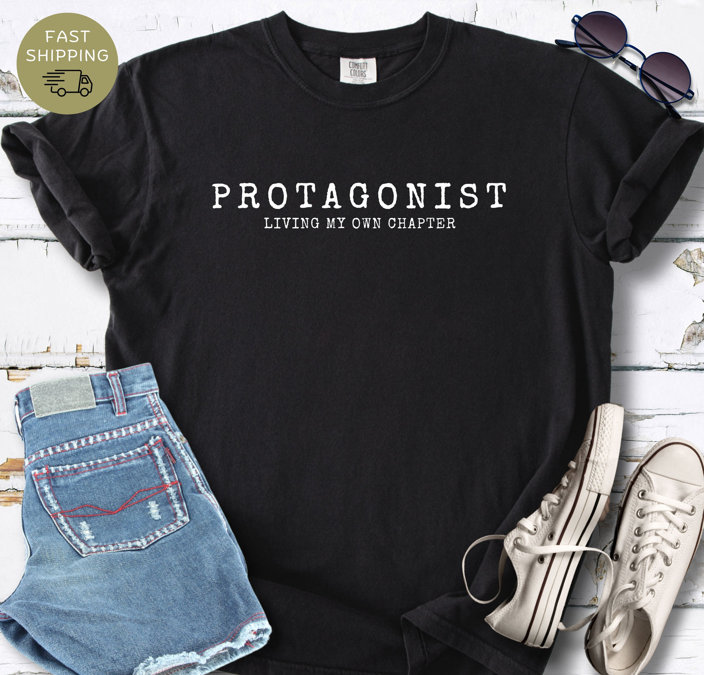 Minimalist book lover shirt with protagonist quote in black color