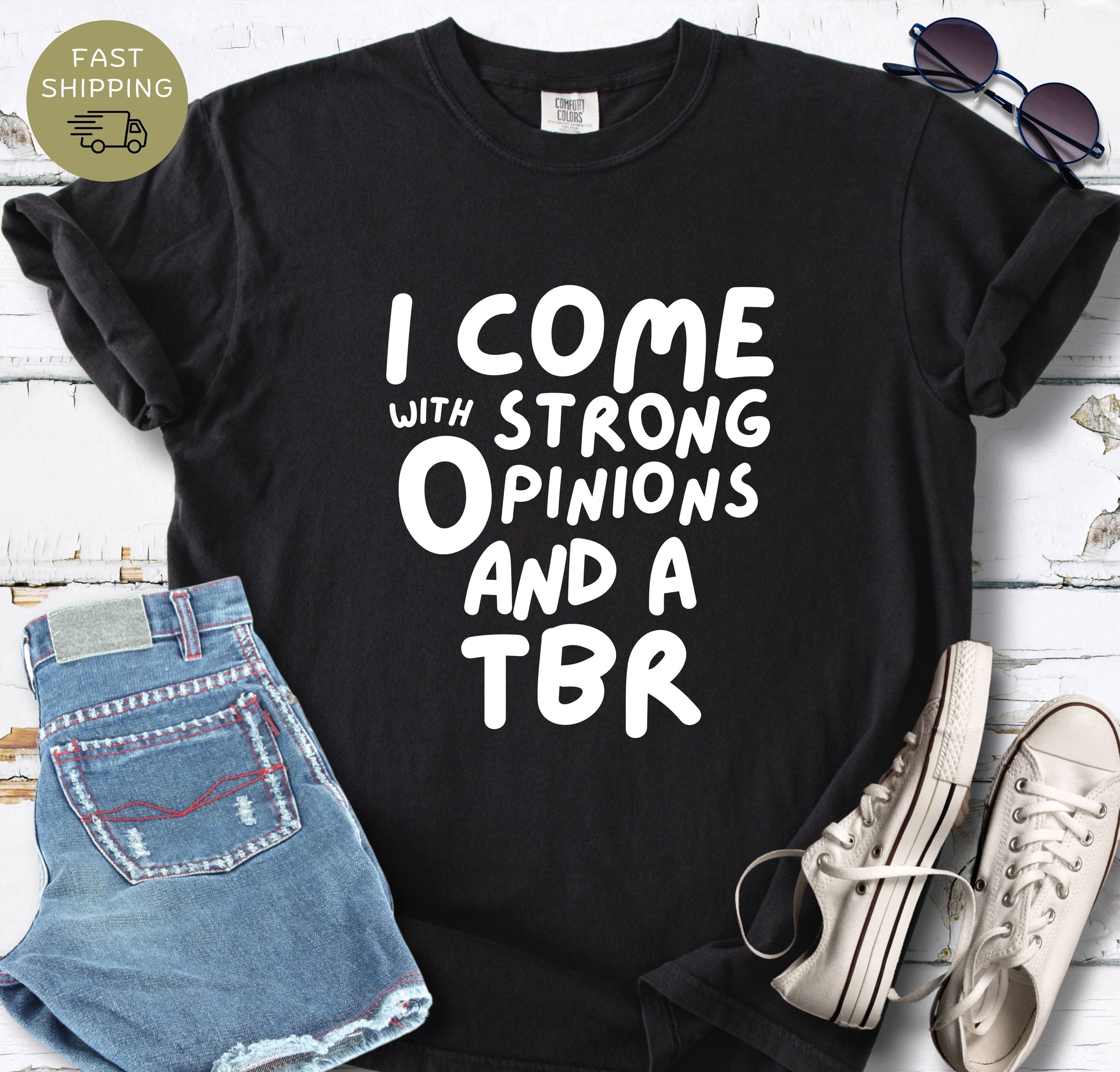 Funny book lover shirt in black color with bold reader slogan