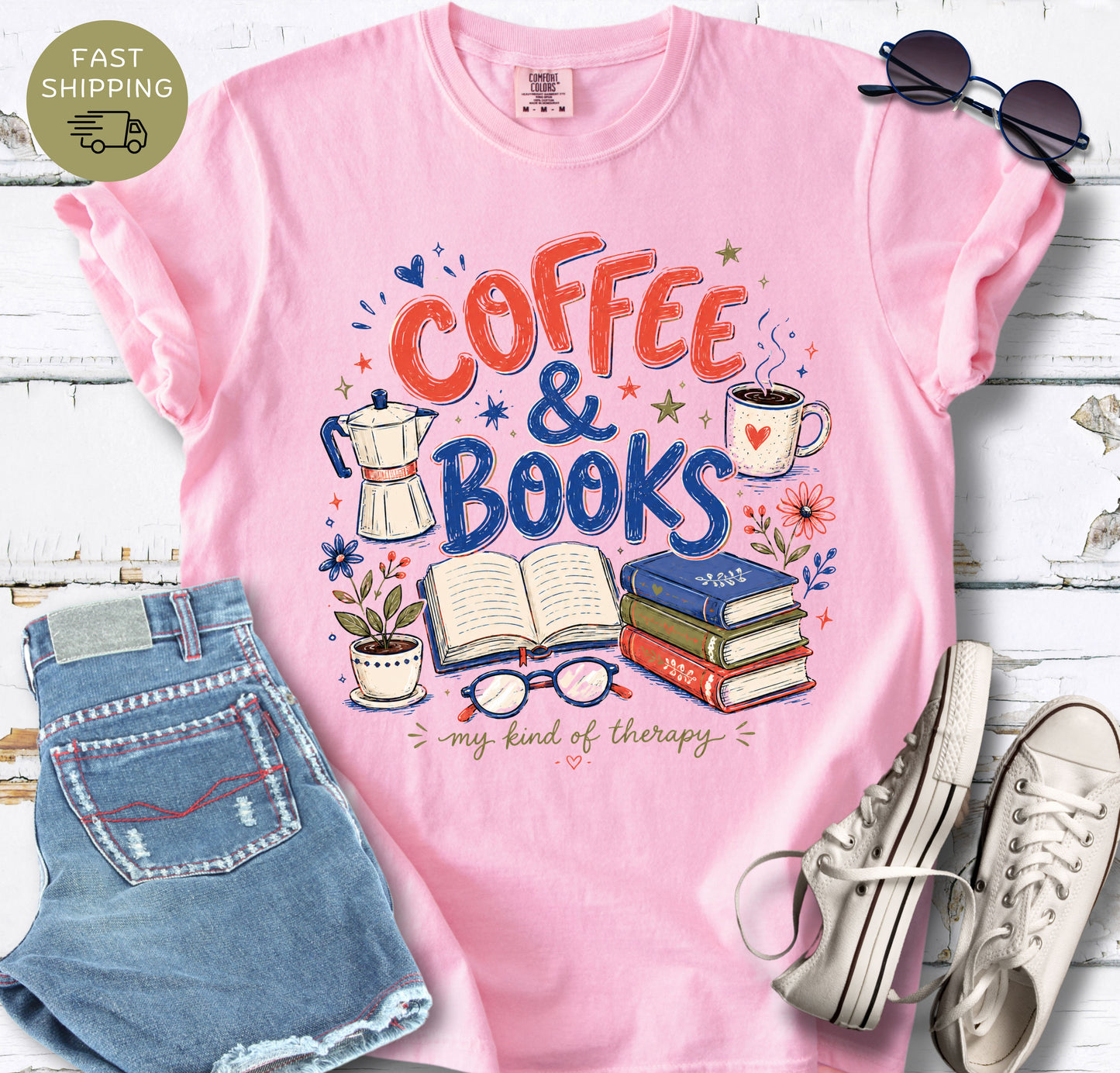 Comfort Colors bookish t-shirt styled with jeans, sneakers, and sunglasses flat lay.