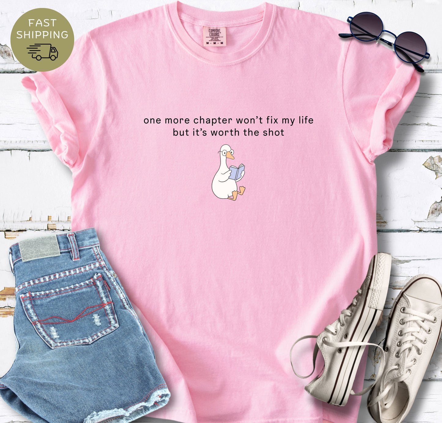 Cozy bookish t-shirt with minimalist typography and duck graphic