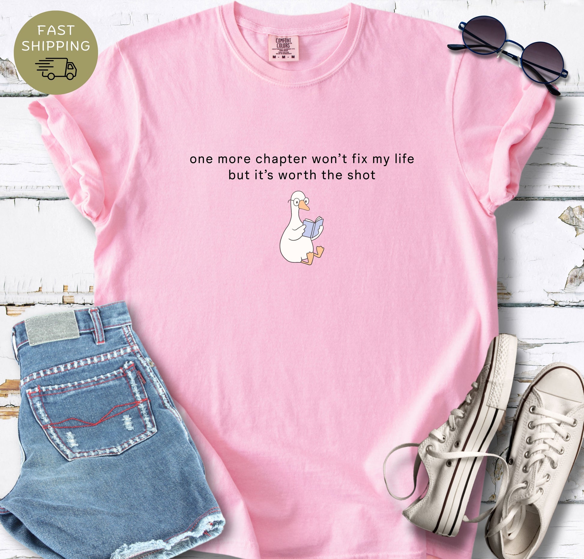 Cozy bookish t-shirt with minimalist typography and duck graphic