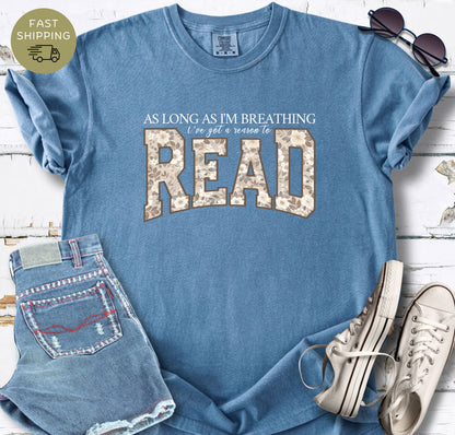 Relaxed-fit reader T-shirt with a meaningful reading quote and neutral floral typography.