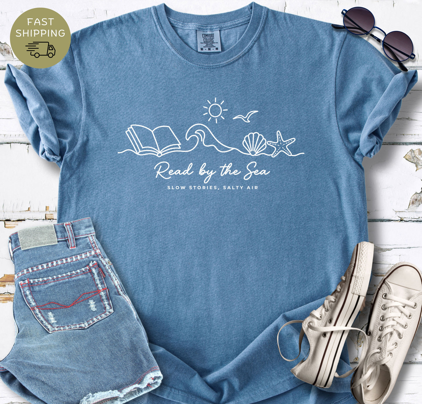Blue jeans summer book lover shirt with minimalist sea-themed graphic