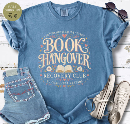 Women’s bookish T-shirt in black styled with denim shorts, sunglasses and white trainers.