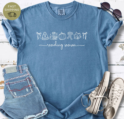 Comfort Colors blue jeans tee with warm off white bookish autumn design for book lovers.