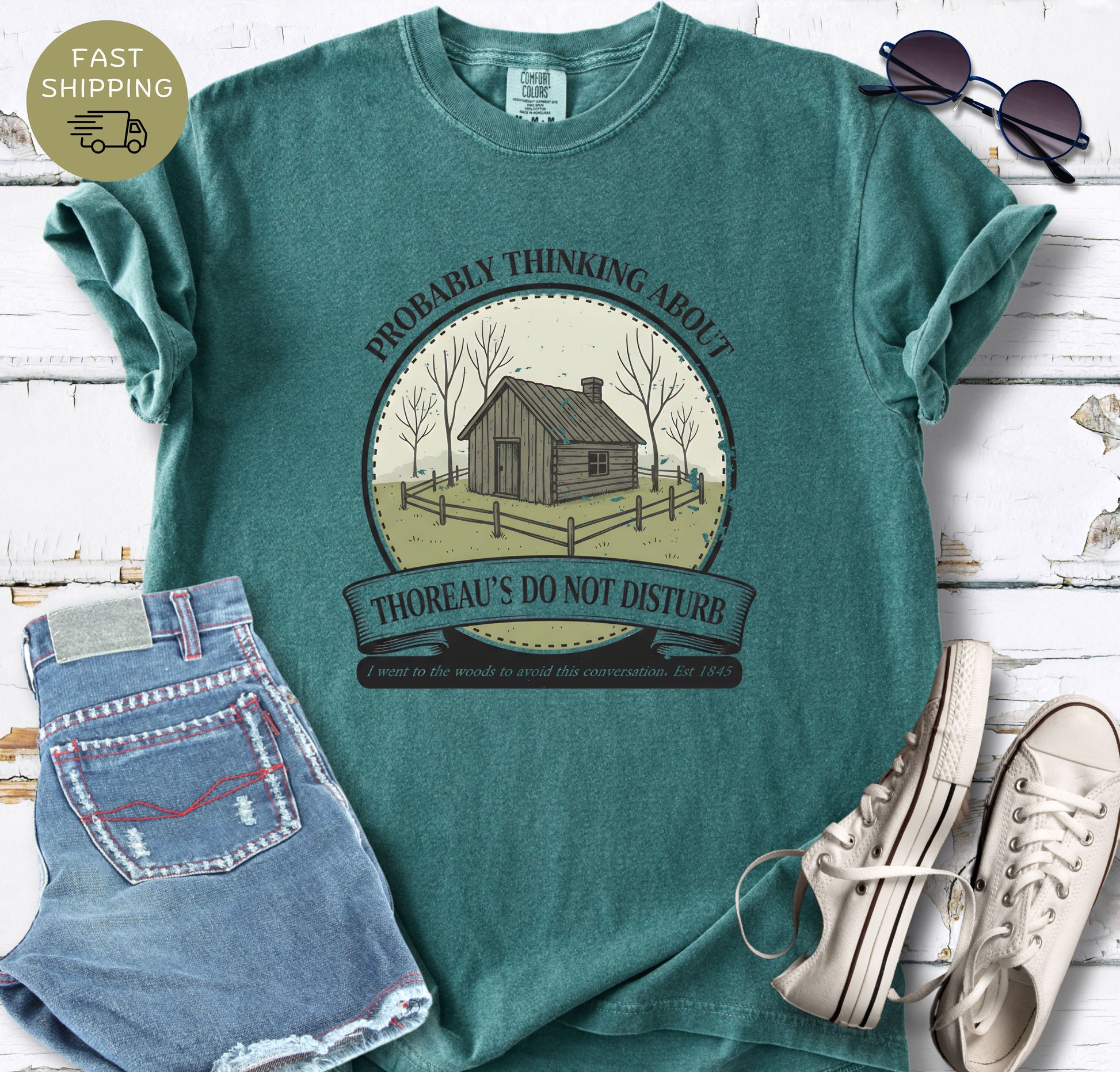 Comfort Colors Blue Spruce shirt with “Probably Thinking About Thoreau” artwork