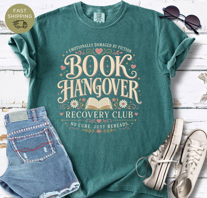 Comfort Colors reading shirt with ornate typography, small hearts, flowers and an open book illustration.