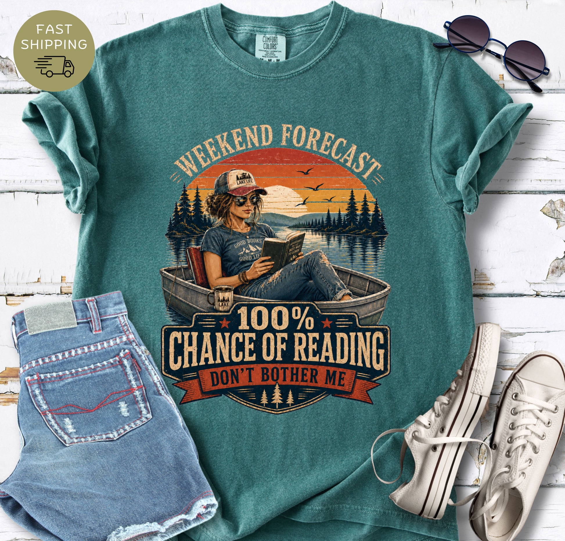 Comfort Colors graphic tee for book lovers featuring a peaceful lakeside reading design.