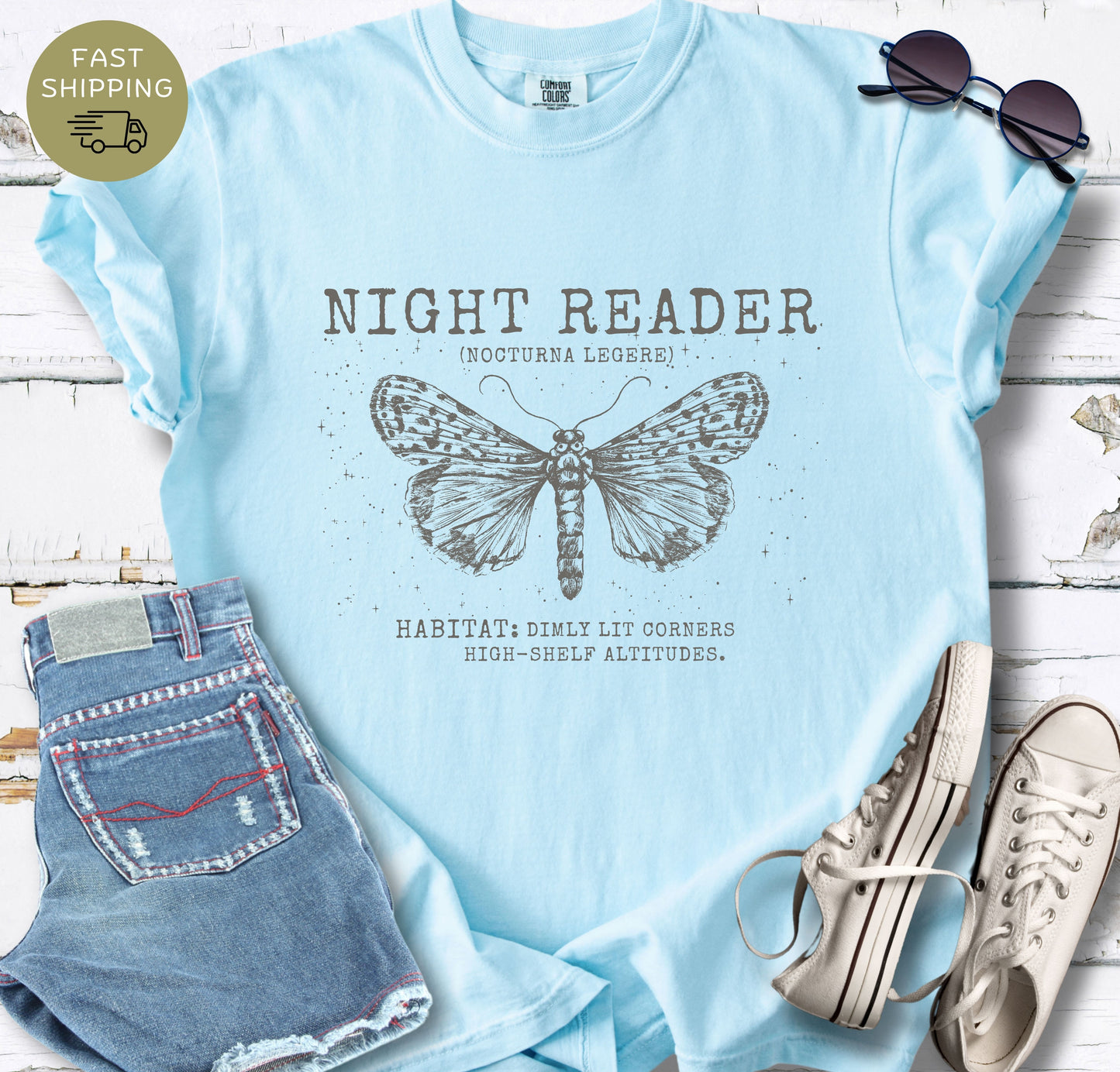 Chambray book lover shirt with celestial moth graphic and Night Reader typography