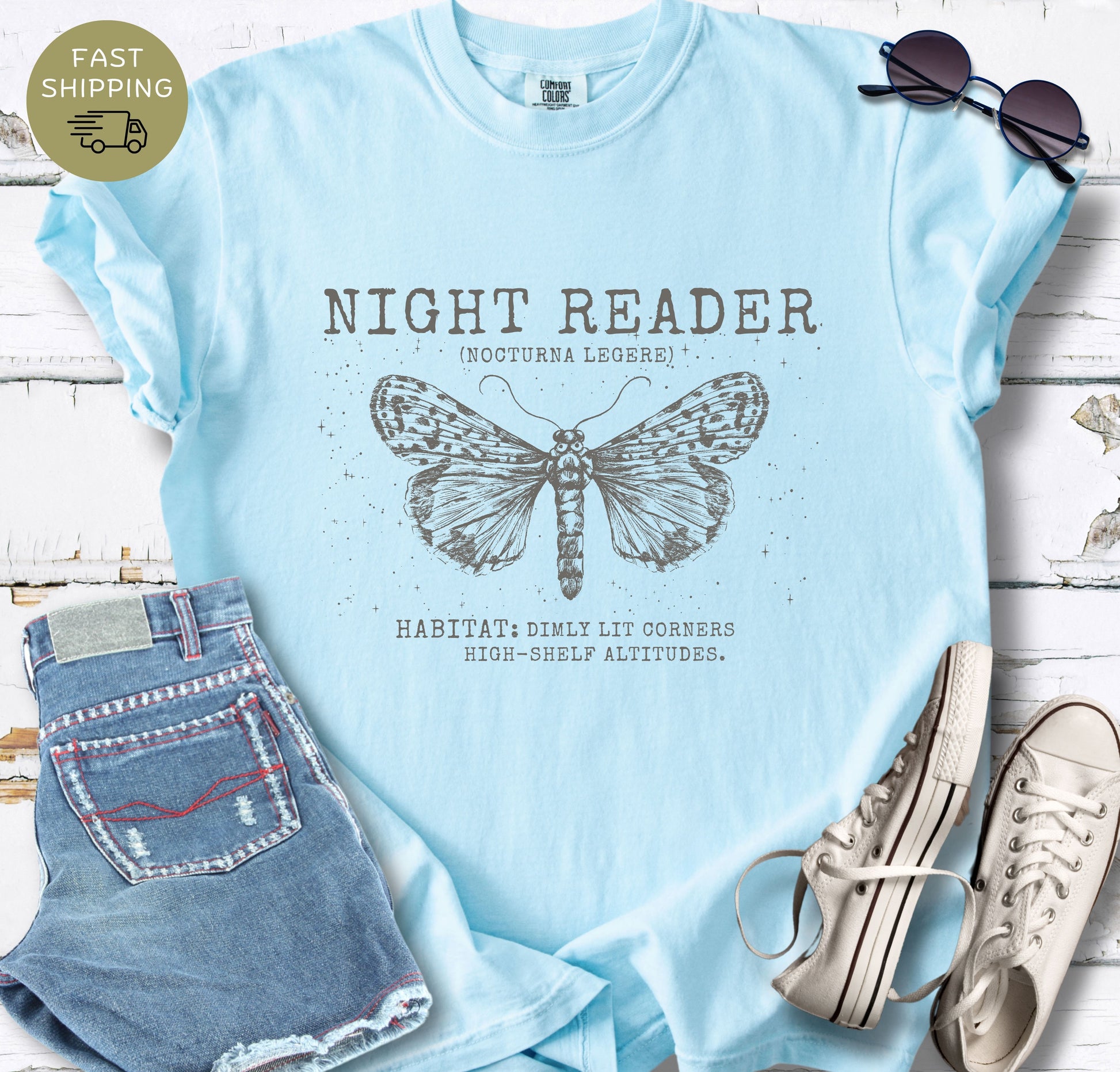 Chambray book lover shirt with celestial moth graphic and Night Reader typography