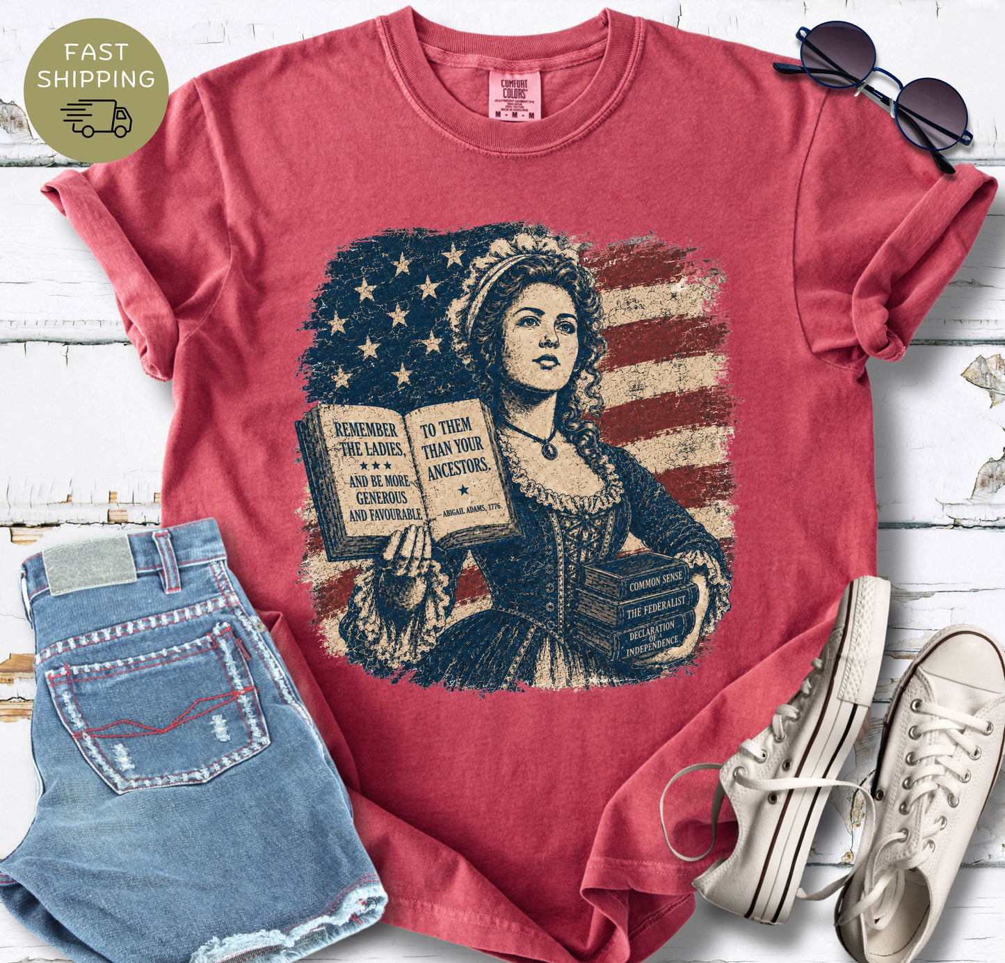 Crimson Comfort Colors shirt with distressed red, cream, and navy patriotic bookish design.
