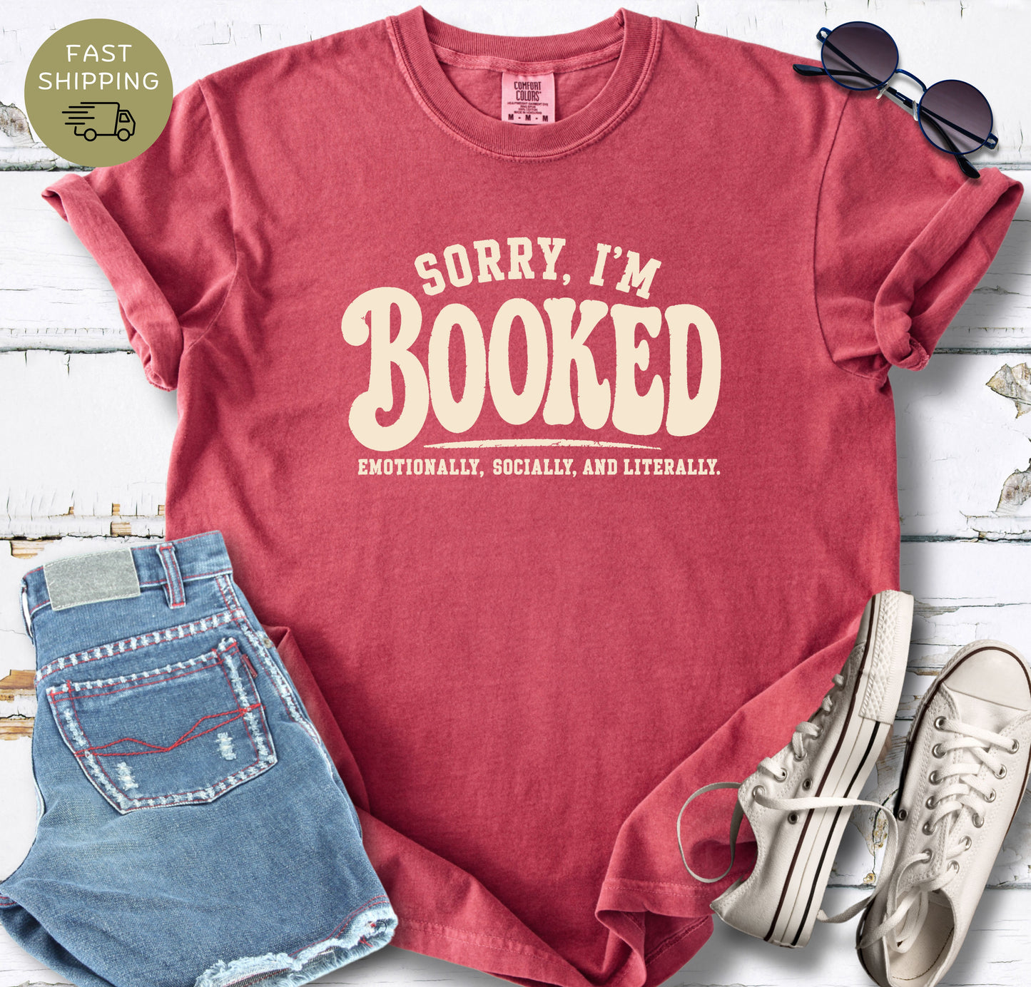 Cream text book lover shirt on a crimson garment-dyed Comfort Colors tee.