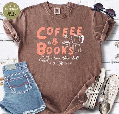 Cozy reader T-shirt featuring a coffee and books design in soft coral and cream tones.