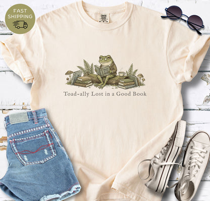 Cute cottagecore reader shirt with frog reading book graphic