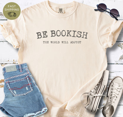 Minimal book lover shirt featuring the phrase Be Bookish The World Will Adjust.