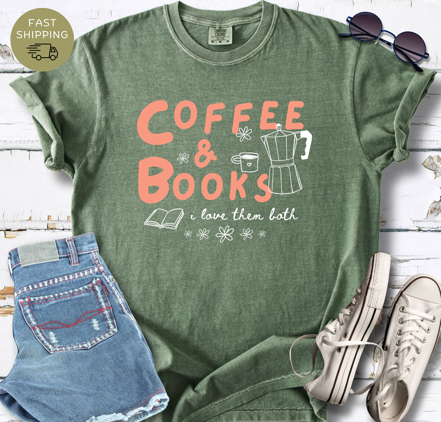 Book lover graphic tee with coffee-themed artwork, including a moka pot, mug and open book illustration.