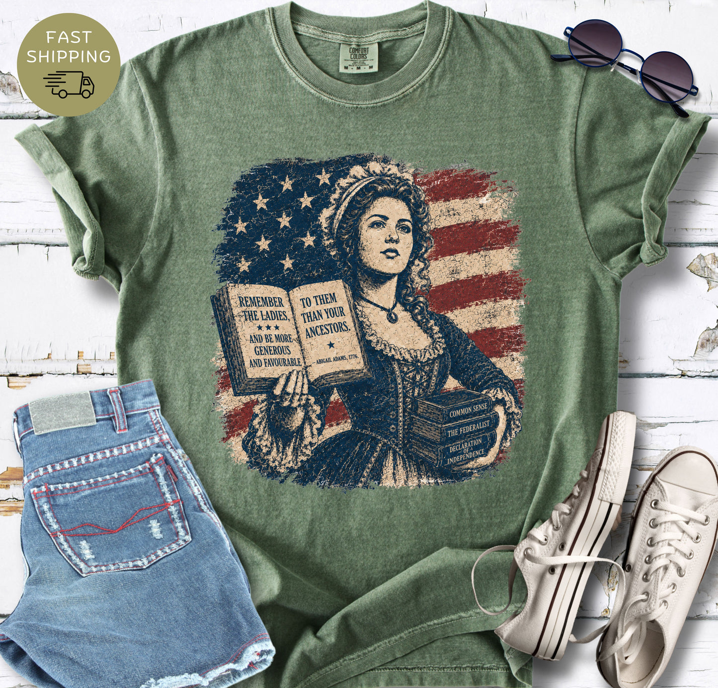 Remember the Ladies graphic t-shirt styled with denim shorts, sneakers, and sunglasses.