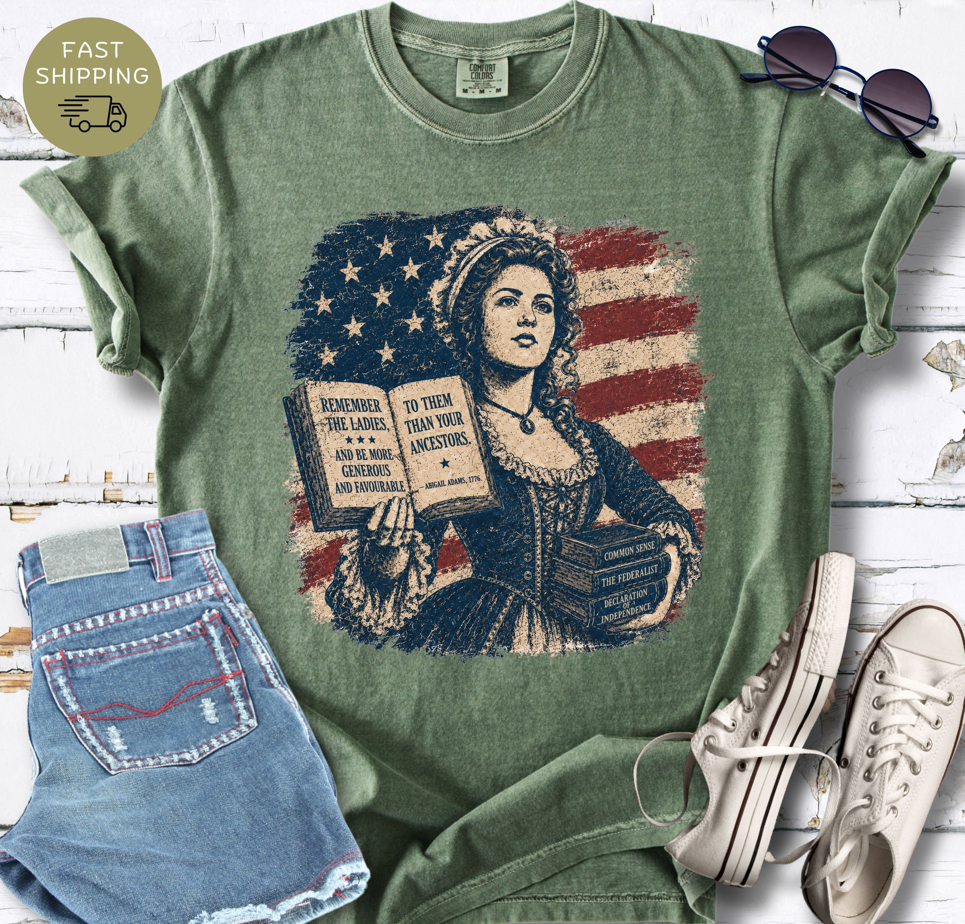 Remember the Ladies graphic t-shirt styled with denim shorts, sneakers, and sunglasses.