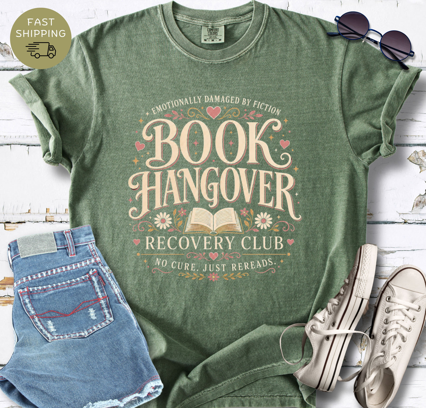 Reader gift shirt featuring “Book Hangover Recovery Club” in cream, pink and gold tones.