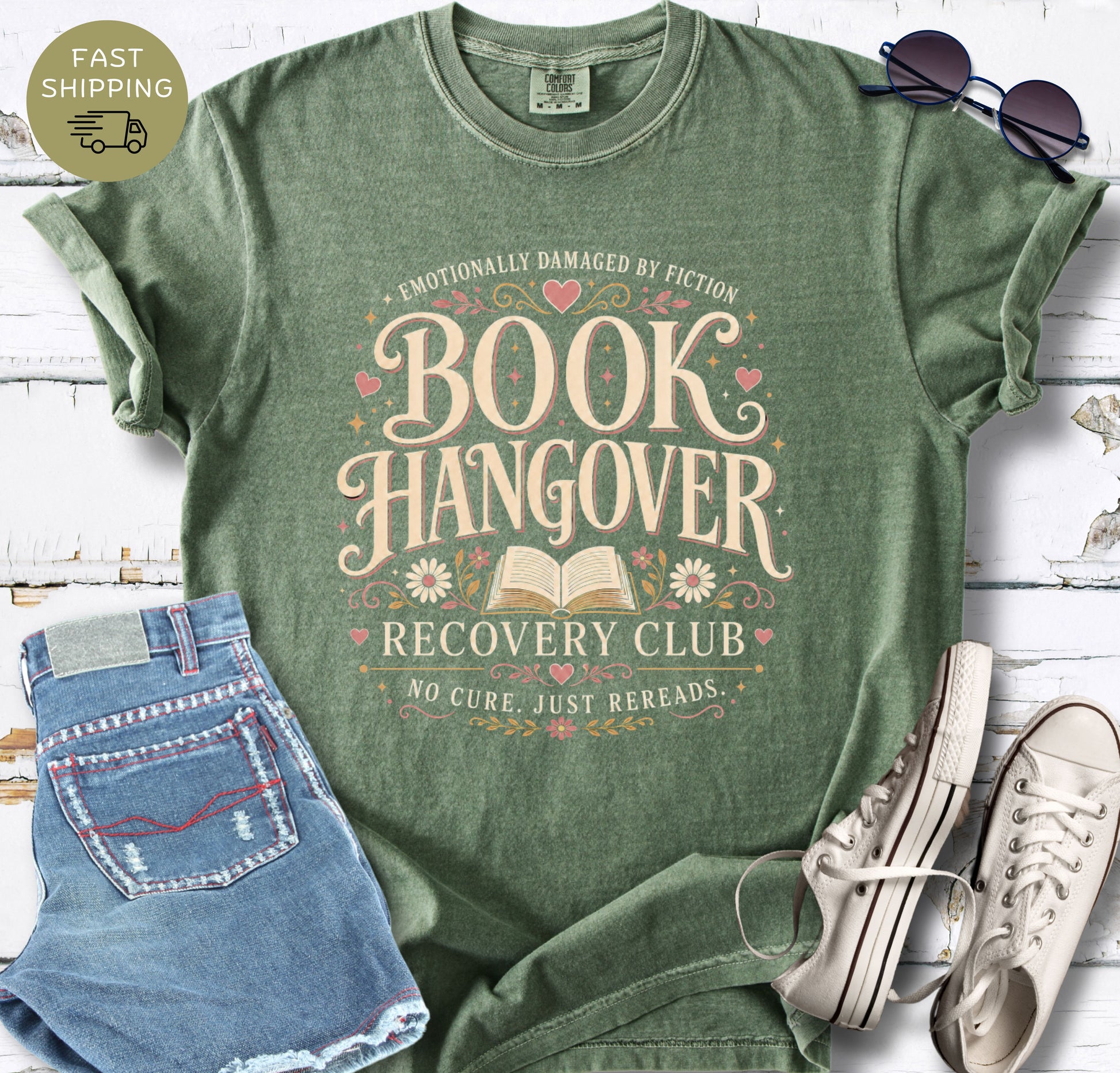 Reader gift shirt featuring “Book Hangover Recovery Club” in cream, pink and gold tones.