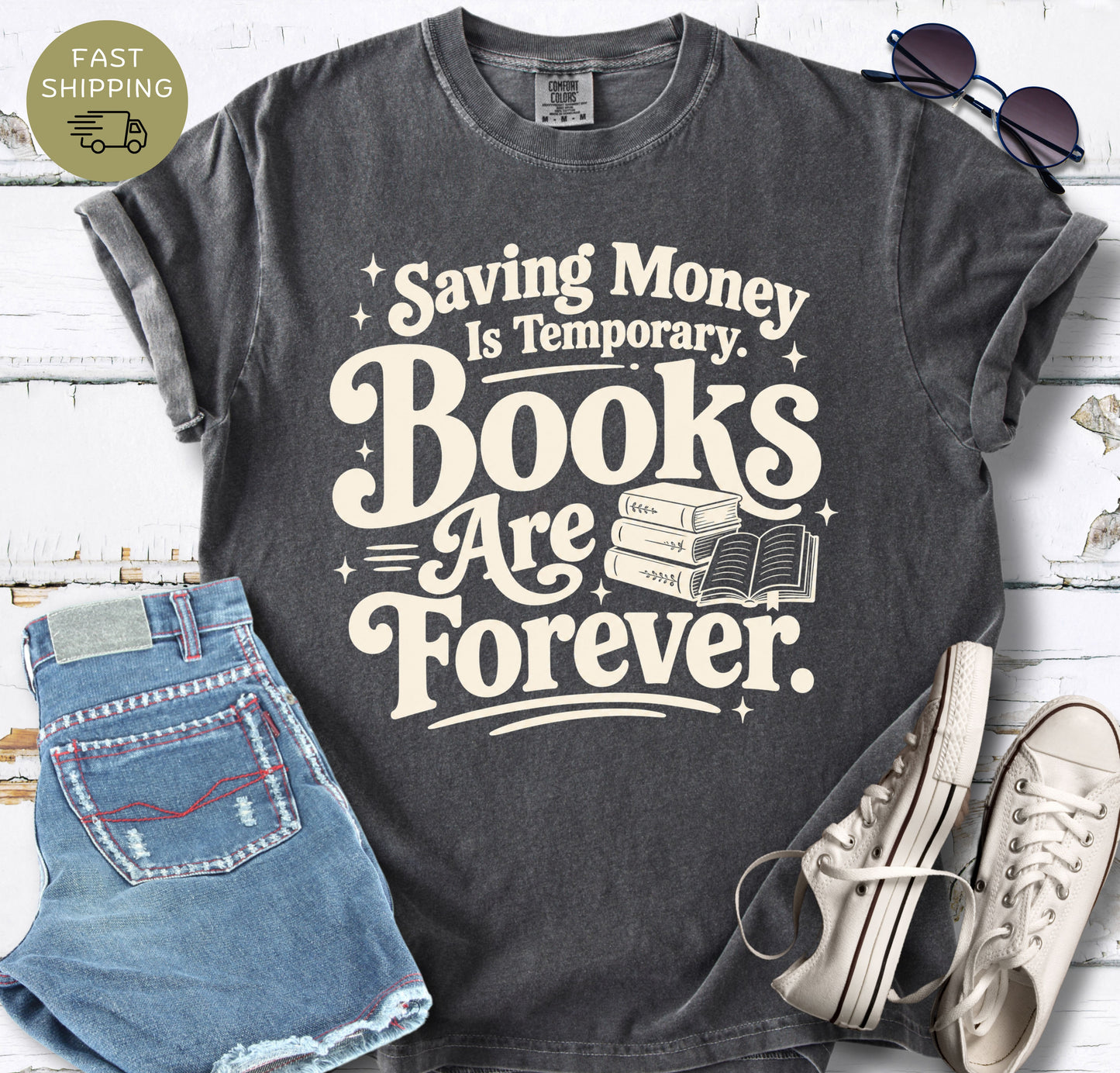 Pepper Comfort Colors T-shirt featuring the phrase “Saving Money Is Temporary. Books Are Forever.”