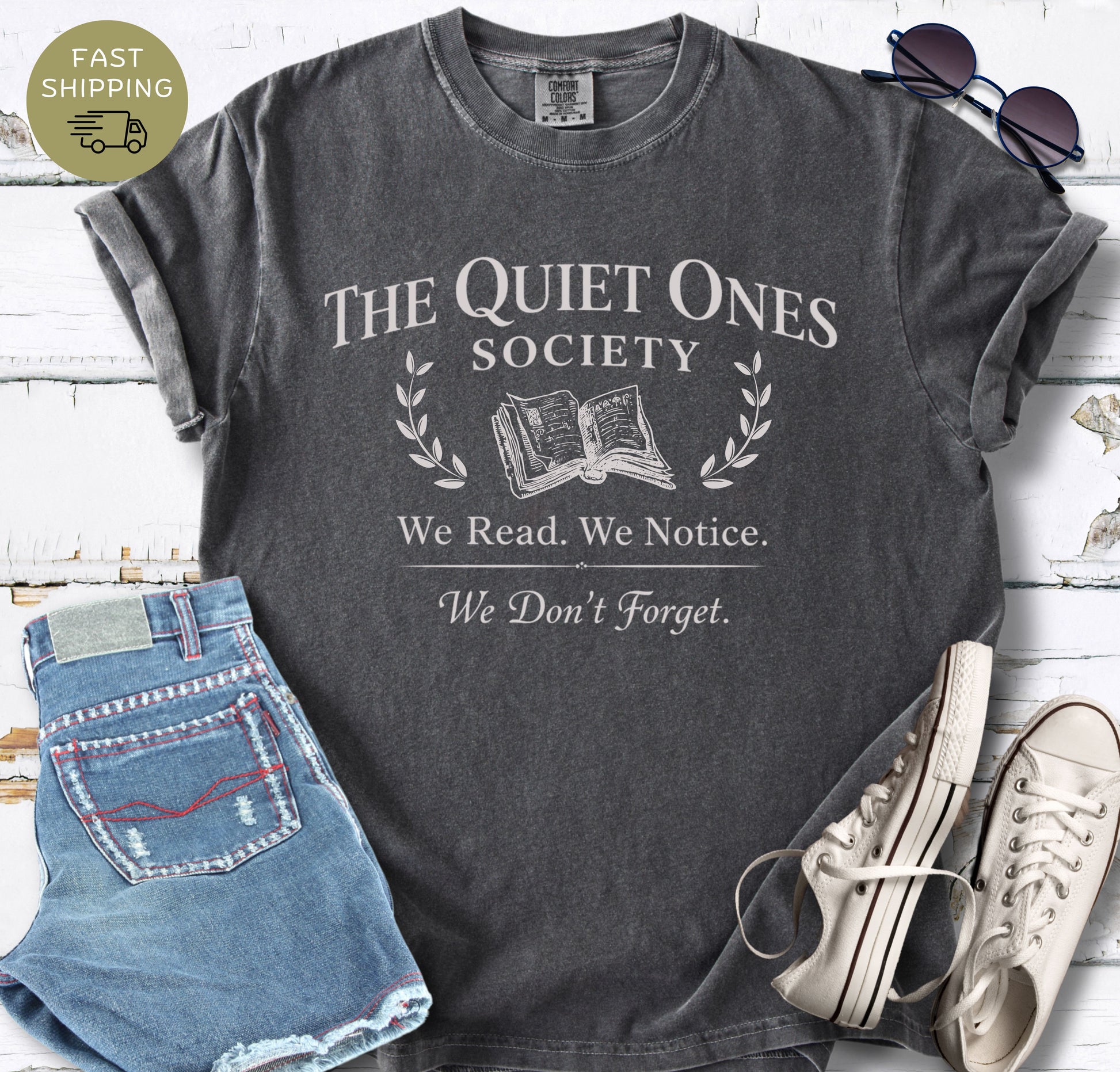Bookish quote tee for readers and bibliophiles with laurel and open book graphic
