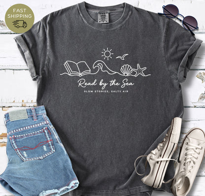 Minimalist coastal bookish tee with line art wave and open book