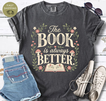 Pepper Comfort Colors t-shirt with “The Book Is Always Better” floral book lover design