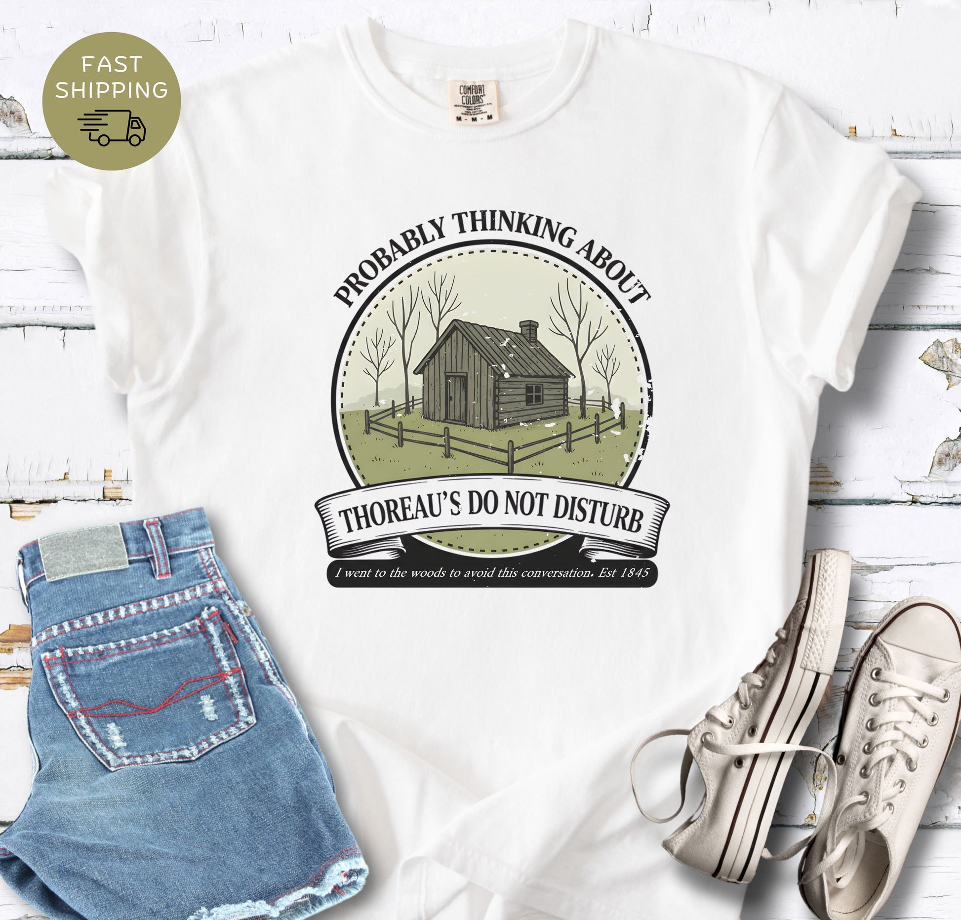 Vintage style book lover tee with Thoreau inspired cabin badge design