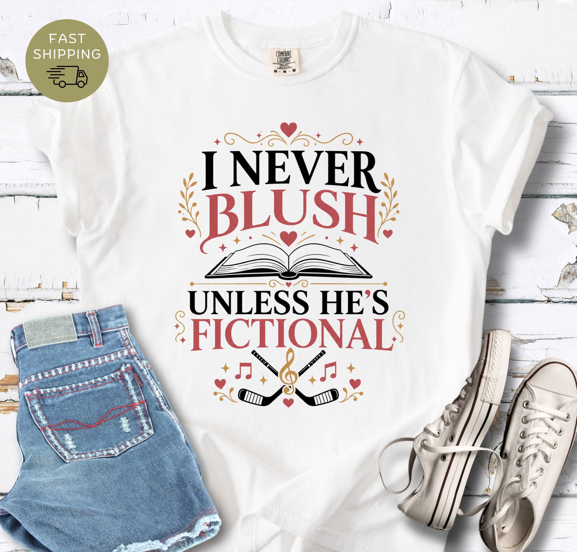 White romance reader shirt with open book, hearts, and hockey sticks graphic